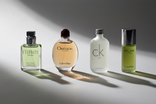 Load image into Gallery viewer, Calvin Klein Men’s Mini Coffret 4-Piece Gift Set Includes: Obsession Men EDT 15ml • Escape Men EDT 15ml • Eternity Men EDT 15ml • CK One EDT 15ml Classic. Versatile. Iconic.
